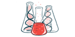 Illustration of three flasks, two with DNA strands and one with a red liquid.
